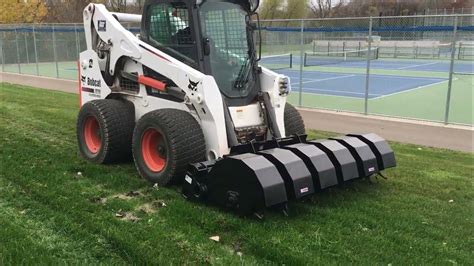 macerator on skid steer|skid steer aerator.